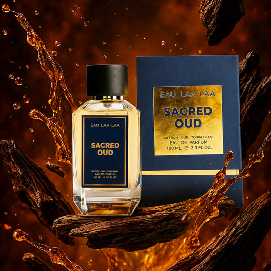 Eau Laa Laa Sacred Oud perfume bottle and packaging on a dark background with water splashes.